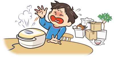 炊飯器の蒸気で手をやけどしている男の子