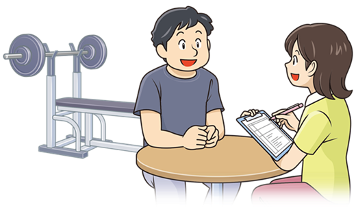 トレーナーがトレーニングメニューを説明している