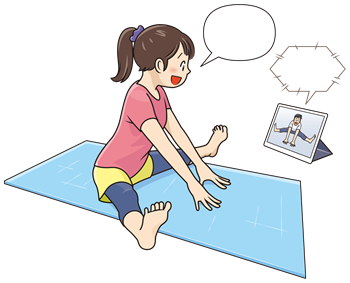 開脚ストレッチをしている